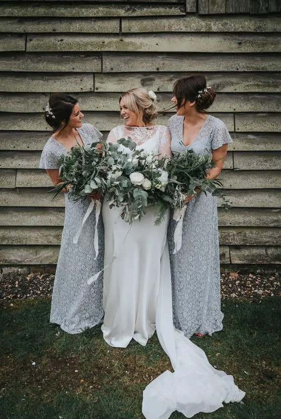 Romantic grey lace fitting bridesmaid dresses with short sleeves and V neckline for a frozen like wedding