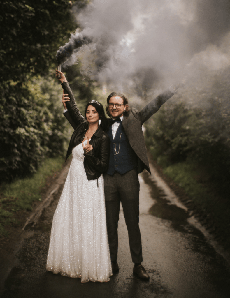 This couple went for a night sky, skulls and rock DIY wedding in the rain