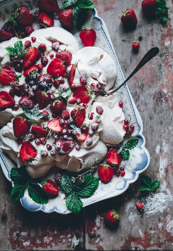 a summer berry pavlova is a delicious substitute for a usual wedding cake