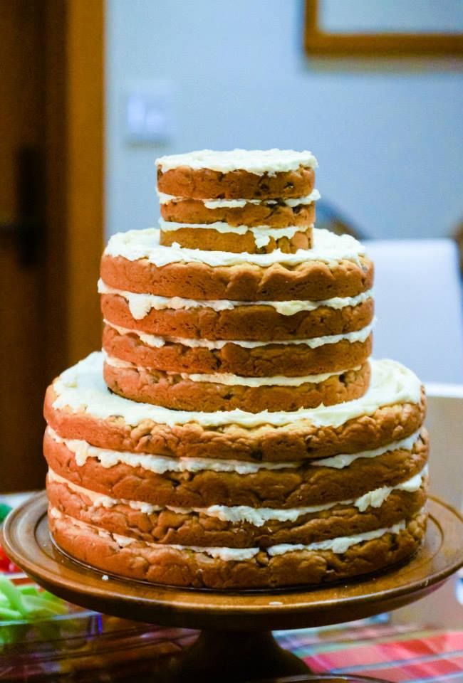a cookie wedding cake with frosting is a simple and homey idea for a backyard wedding