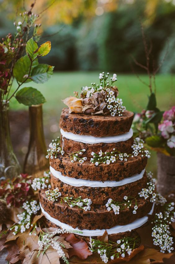 a cookie wedding cake with bold blooms and a calligraphy topper is a pretty and very easy dessert to make yourself