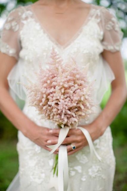 a tender and sweet blush astilbe wedding bouquet with ribbons is a lovely idea for a bride who loves soft shades