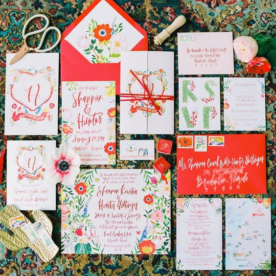 a colorful summer wedding invitation suite in red, yellow, green and orange, with hand painting and fun letters is amazing