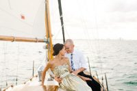 09 a gold sequin strapless A-line wedding dress with a pleated bodice and train is a lovely idea for a nautical wedding