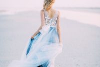 19 an A-line wedding dress with a lace bodice on thick straps, a layered skirt in navy and white is a dreamy idea for a nautical wedding
