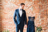 20 a strapless navy A-line wedding dress with gold leaf is a gorgeous idea for an elegant and chic nautical wedding