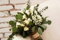 23 a lovely wedding bouquet of white roses, baby’s breath, eucalyptus and with a burlap wrap is great for a nautical wedding