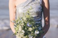 25 a silver sequin one shoulder fitting wedding dress is a gorgeous solution for a modern nautical bride