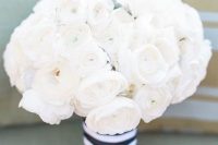 29 a white peony rose wedding bouquet with a wide striped ribbon is a classic idea for a nautical wedding