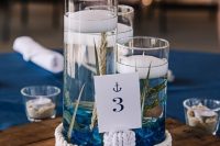 a nautical centerpiece with a table numbers