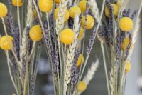 cool rustic wedding centerpiece of wheat, lavender and billy balls are perfect for rustic summer or fall wedding