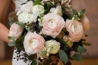 03 a stylish wedding bouquet of white and blush ranunculus, eucalyptus and privet berries is summer classics for any wedding