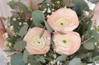 05 a lovely wedding bouquet of blush ranunculus, eucalyptus and baby’s breath is a stylish and beautiful idea for a spring or summer bride