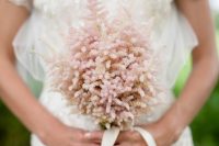 09 a lovely astilbe wedding bouquet is a pretty addition to your wedding look and will bring a bit of color