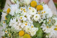 13 a bright and dimensional summer wedding bouquet of daisies, billy balls, white blooms, succulents, greenery and ranunculus is a fun and fresh idea