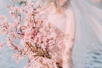 a cute cherry blossom wedding bouquet
