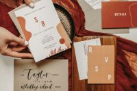 a bright wedding invitation suite with rust, burgundy, grey touches, with fun and bold modern lettering for a fall wedding