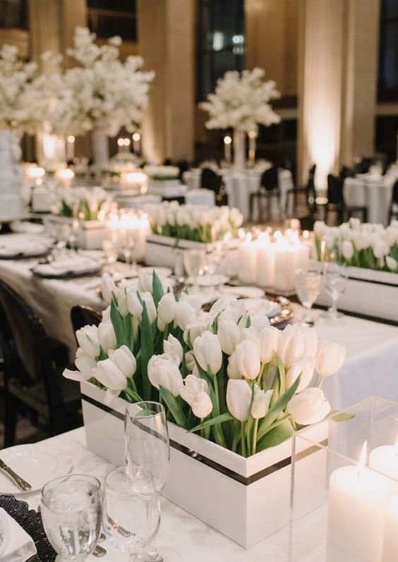 a chic and luxurious wedding centerpiece of a box with white tulips is a beautiful solution for a modern lux wedding