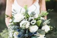 a classy wedding bouquet of white peonies, anemones, thistles, greenery with a macrame wrap is a great idea for spring or summer