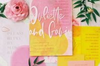 a colorful abstract wedding invitation suite with hot pink, yellow and peachy pink elements, with fun lettering for a cheerful summer wedding