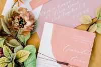 a lovely abstract wedding inivtations in peachy and pale pink, with calligraphy and modern letters is a cool solution for spring or summer