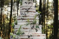 a stylish forest-inspired naked wedding cake