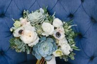a neutral wedding bouquet of wihte anemones and peonies, succulents, thistles and greenery will match many bridal styles