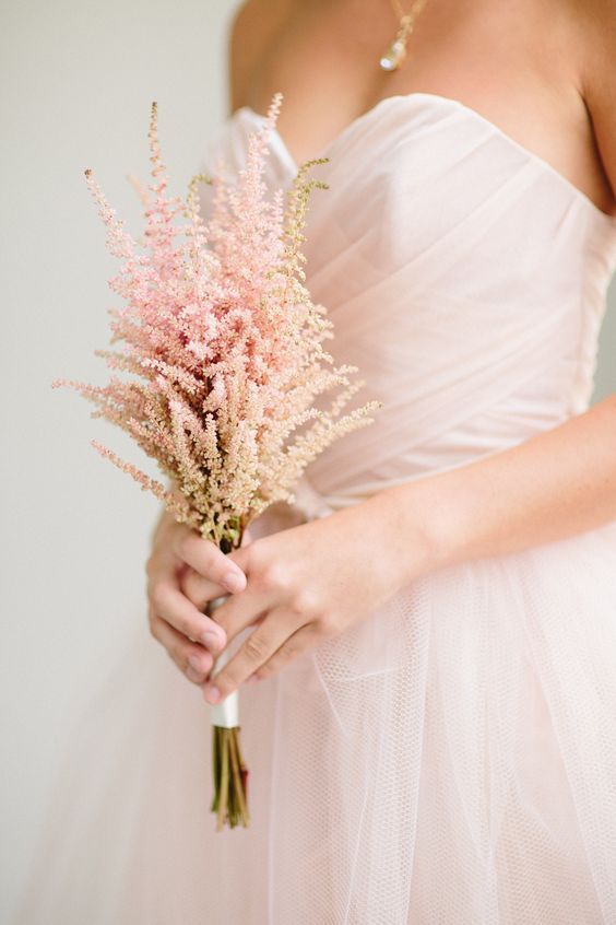 a pretty and delicate astilbe wedding bouquet is a cool way to save the budget on blooms and it looks very fashionable