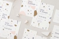 a pretty and fun terrazzo wedding invitation suite with blush, blue and gold touches and lilac printing is a lovely and cool idea for a cheerful wedding