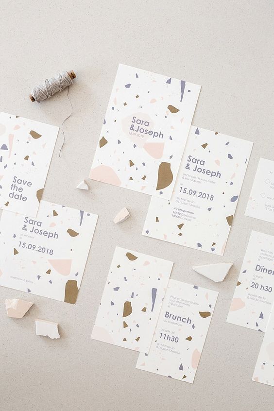 a pretty and fun terrazzo wedding invitation suite with blush, blue and gold touches and lilac printing is a lovely and cool idea for a cheerful wedding