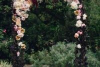 a refined fall garden wedding arch covered with leaves, with white, pink, burgundy and rust blooms is a lovely idea for a sophsticated wedding