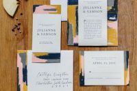 a stylish abstract wedding invitation suite in navy, pink, grey and myustard and with chic lettering is a gorgeous idea for a fall wedding