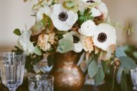 a gorgeous centerpiece with lots of white flowers