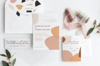a subtle wedding invitation suite with pink, rust, black and grey touches inspired by terrazzo is great for spring or summer