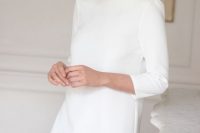 04 a very cool and simple plain mini wedding dress with a high neckline and short sleeves plus a ruffle edge is a stylish casual idea