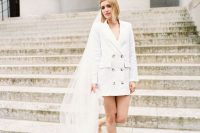 18 a short white blazer wedding dress, strappy heels and a long veil for an ultra-modern and casual bridal look