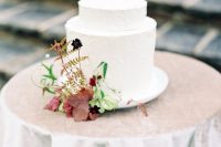 a stylish white wedding cake