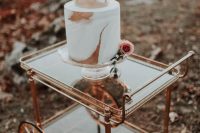 36 a refined modern fall wedding cake with rust and dusty pink brushstrokes and a single pink rose is a very cool idea for the fall