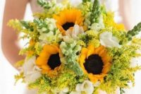 a bright wedding bouquet of sunflowers, white blooms and mimosas is an amazing idea for a colorful summer wedding