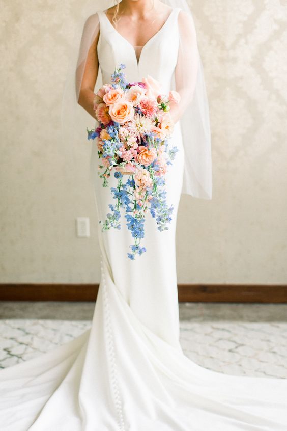 a cool pastel cascade wedding bouquet