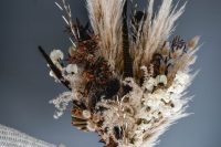 a dreamy dried flower wedding bouquet of pampas grass, wheat, blooms, fronds and lavender is a cool idea for fall or summer