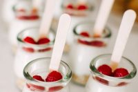 03 a yogurt bar with fresh yogurt, berries and granola is a very healthy and cool idea for a brunch wedding