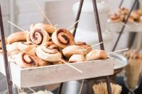 05 a cinnamon bun stand is a perfect idea for a brunch wedding, such a station will be a great idea fro a brunch