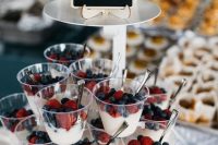 11 a parfait stand is a gorgeous idea for a modern brunch wedding, serve fresh yogurt with fresh berries and amek everyone happy