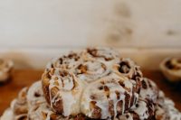 29 a cinnamon roll stack wedding cake is a gorgeous solution for a brunch wedding