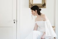 a modern off-the shoulder wedding dress