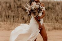 a lovely modern off the shoulder midi wedding dress with white cowboy boots is a cool solution for a bold boho bride
