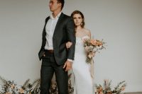 a modern flare wedding dress with a bustier bodice, a long train is a very sexy idea for a romantic and seductive bridal look