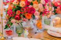 a cute colorful tablescape with a floral centerpiece