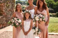 blush slip midi bridesmaid dresses with V-necklines and asymmetrical skirts for a glam spring or summer wedding